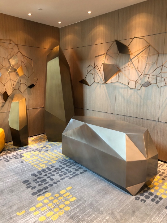 Brushed finishing sculpture for hotel lobby