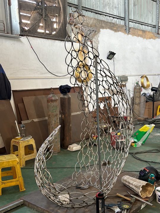 Manufacturing process of sculpture